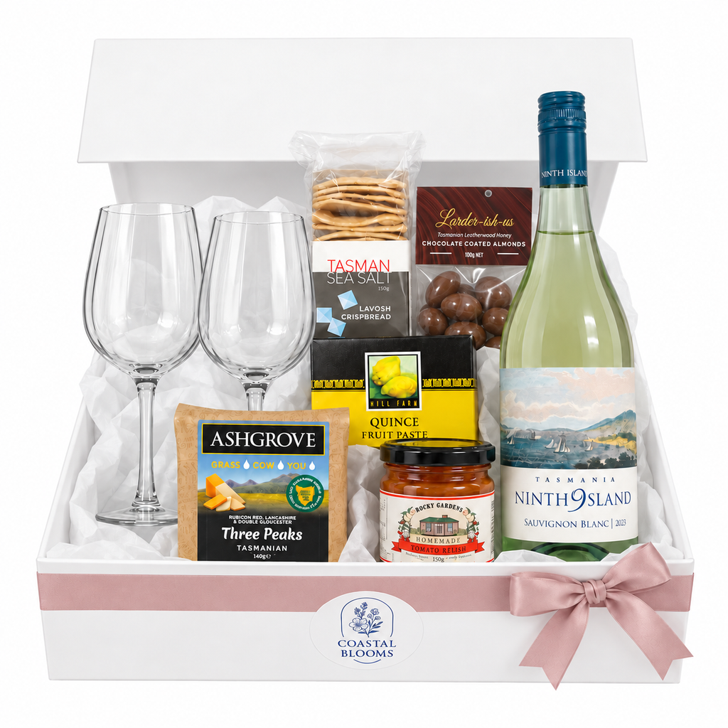 Cheese and wine hamper with Ninth Island wine, clear glasses, Tasmanian cheese, relish and gourmet treats
